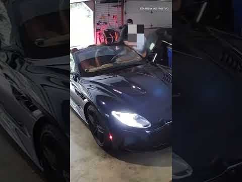 Hear that? It's the sound of a $250K car roaring to life... as the driver is ambushed in his garage.