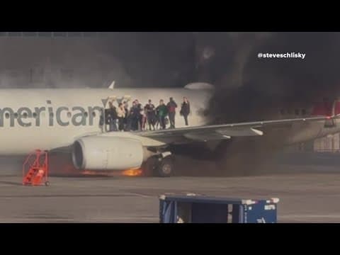 American Airlines plane headed to Dallas catches fire at Denver airport