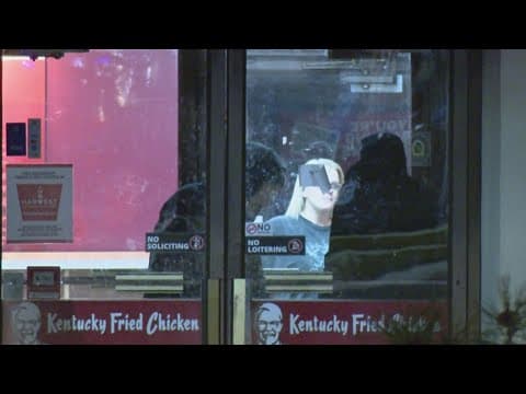 Teen KFC employee who helped shooting victim fired by store