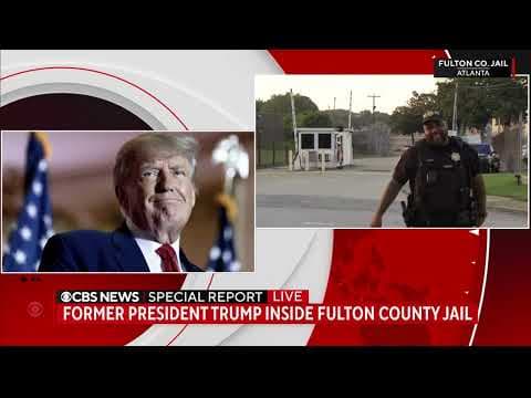 Trump arrives at Georgia jail to surrender on charges he tried to overturn 2020 election