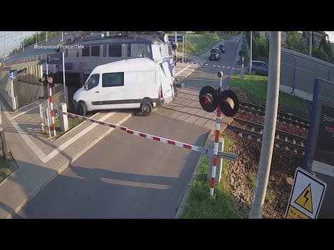 Footage shows Polish delivery van hit by train