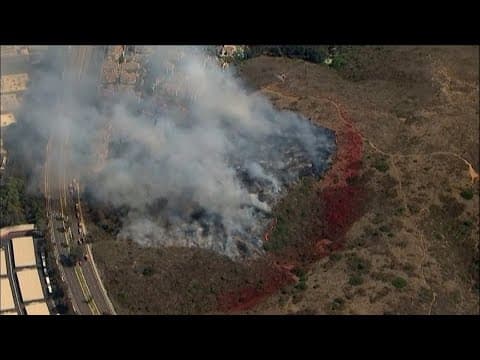 Fire crews battled brush fire in Rancho Bernardo, causing evacuation warning for residents