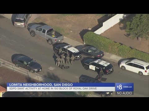 Wanted fugitive prompts SWAT standoff in San Diego neighborhood