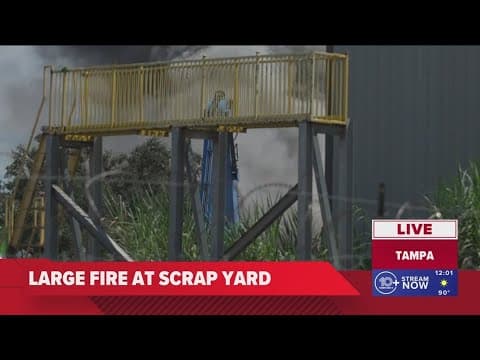 Firefighter transported after scrapyard fire in Tampa