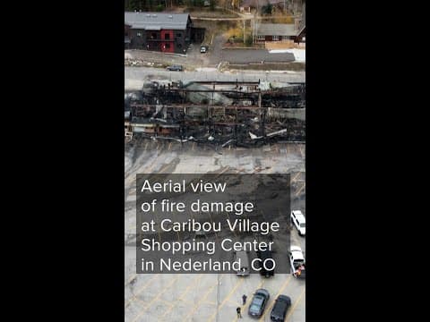 Aerial view of fire damage at shopping plaza in Nederland