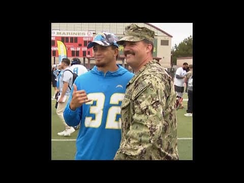Chargers players and coaches pay tribute to service members at Camp Pendleton