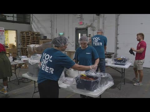 Volunteers package 2,500 meals for United Way