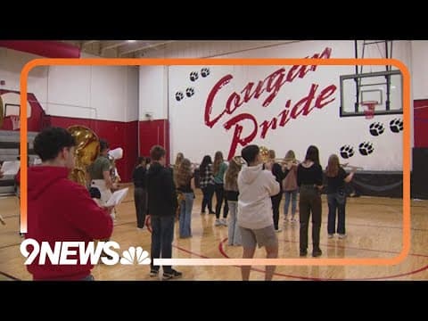 Burlington High band tunes up for Denver's Stock Show parade