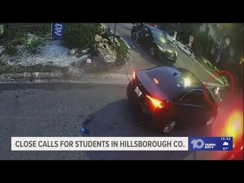 Hillsborough County officials remind drivers to stop for school buses after close calls