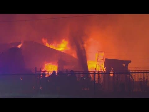 A large fire burns near Dallas Love Field for hours Tuesday