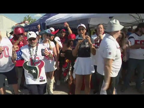 Mia Gradney hanging with tailgaters before the Bucs-Texans primetime showdown