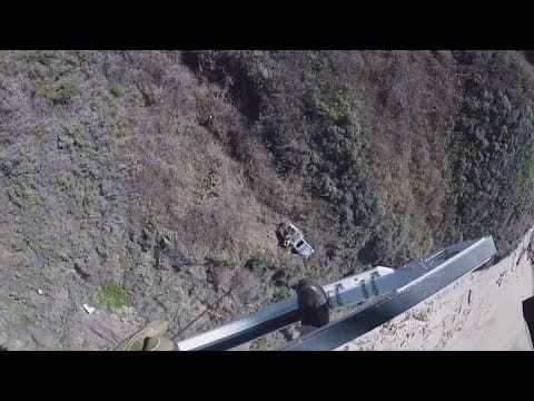 Driver rescued after 2 days stranded on side of cliff