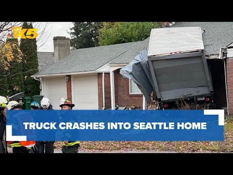 Truck crashes into Seattle home