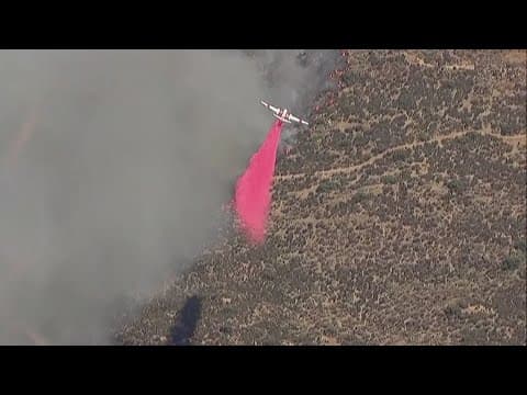 Brush fire spreading rapidly near U.S.-Mexico border in San Diego County