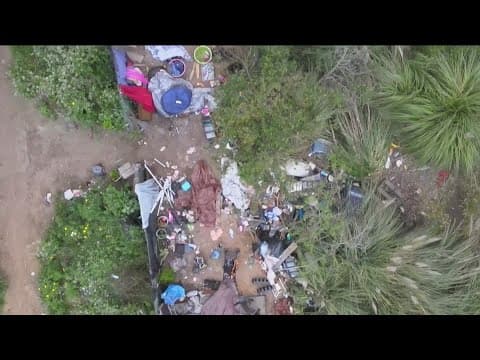 Large homeless encampment across from Plaza Bonita Mall