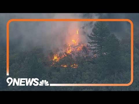 SKY9 over wildfire burning southwest of Denver