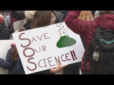 'Stand Up for Science' protestors march at Indiana Statehouse