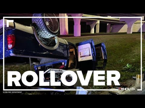 Photos: Truck rolls off freeway near Houston