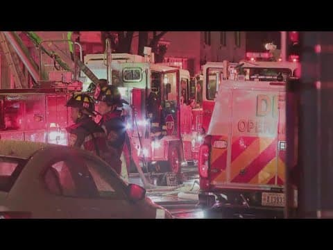 100 firefighters battle fire across buildings in Northwest; 3 hurt