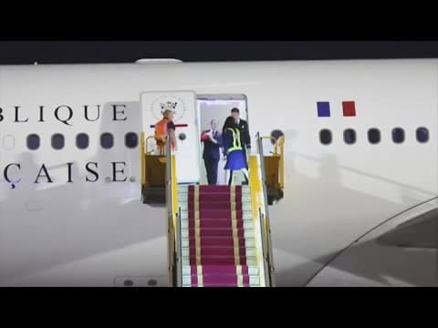 French president Macron downplays awkward moment with wife