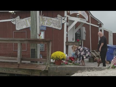 Man arrested after killing 3, wounding 5 others from a boat at North Carolina waterfront bar