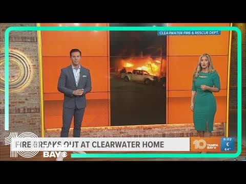 Fire crews battle fire at Clearwater home completely engulfed in flames