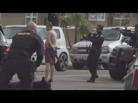 Man accused of murdering father, trying to rob Skyline liquor store appears in court from hospital b