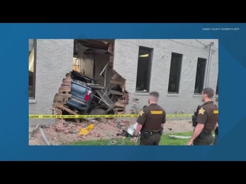 One hospitalized after crash into building in Henry County
