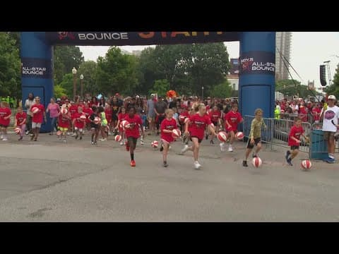 2,500 kids dribble basketballs in downtown Indianapolis for WNBA All-Star Bounce