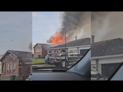 Harvey family, firefighters got away from burning home just in time
