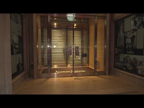 Neiman Marcus' parent company says it still plans to close the iconic downtown store for now